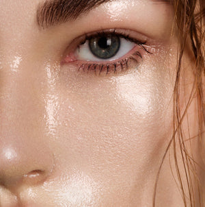 Close-up of radiant glass-like skin showing smooth and luminous texture