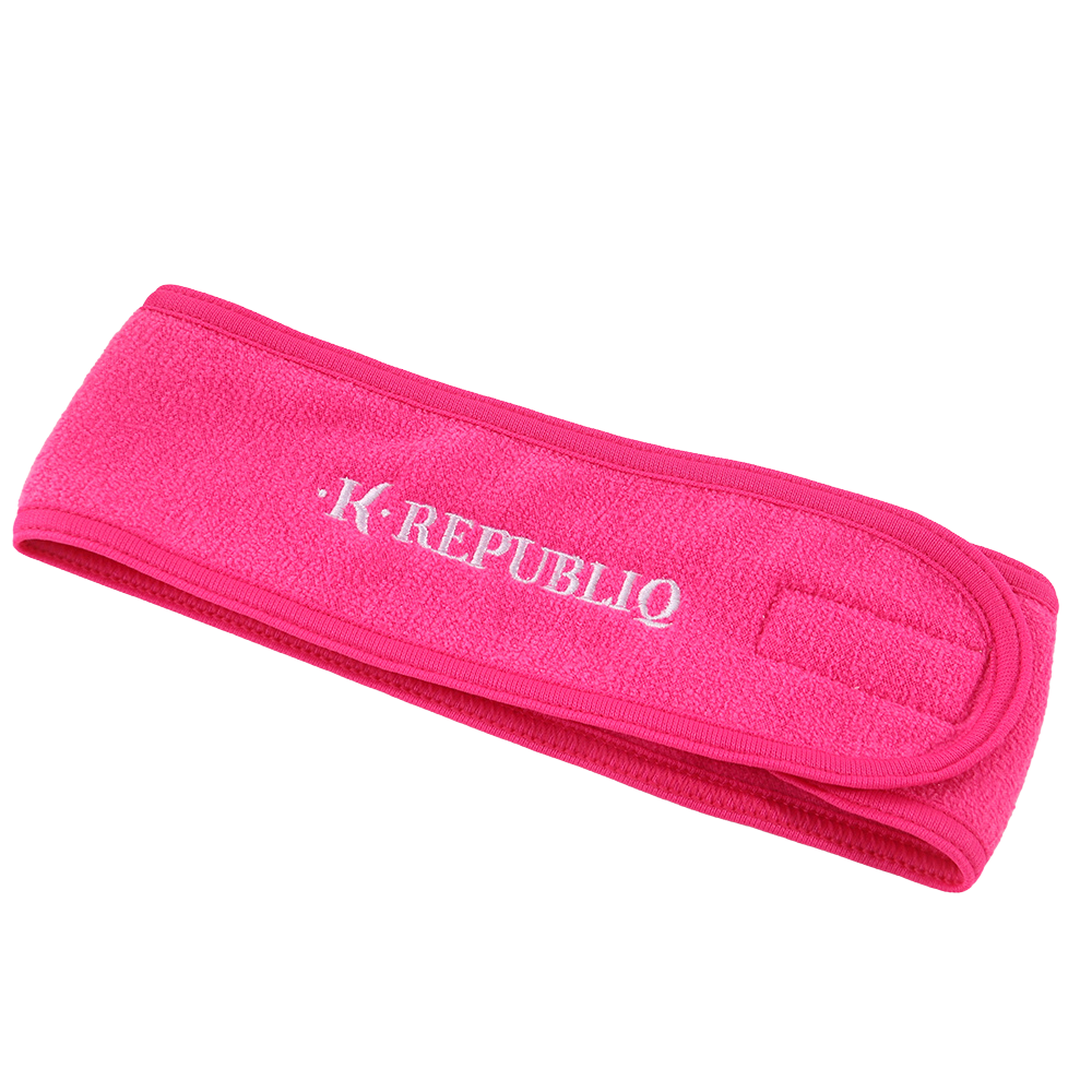 A pink headband with the brand name 'K Republiq' embroidered on it.