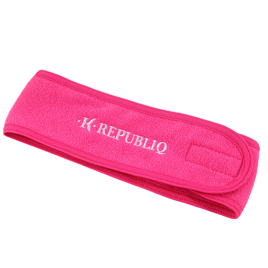 A pink headband with the brand name 'K Republiq' embroidered on it.