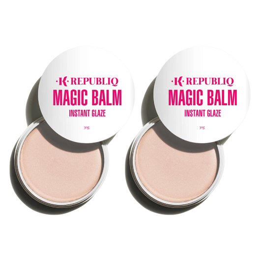 Two compact containers of K Republiq Magic Balm instant glaze, with the product visible through the open lids.