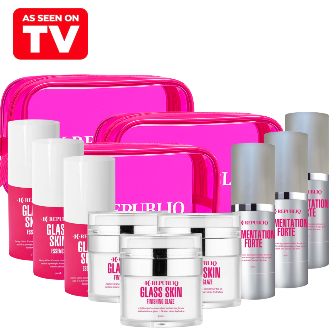 A set of K Republiq skincare products, including Glass Skin Essence, Glass Skin Finishing Glaze, and Pigmentation Forte, displayed in front of a pink cosmetic bag. The text "AS SEEN ON TV" is visible in the top left corner.