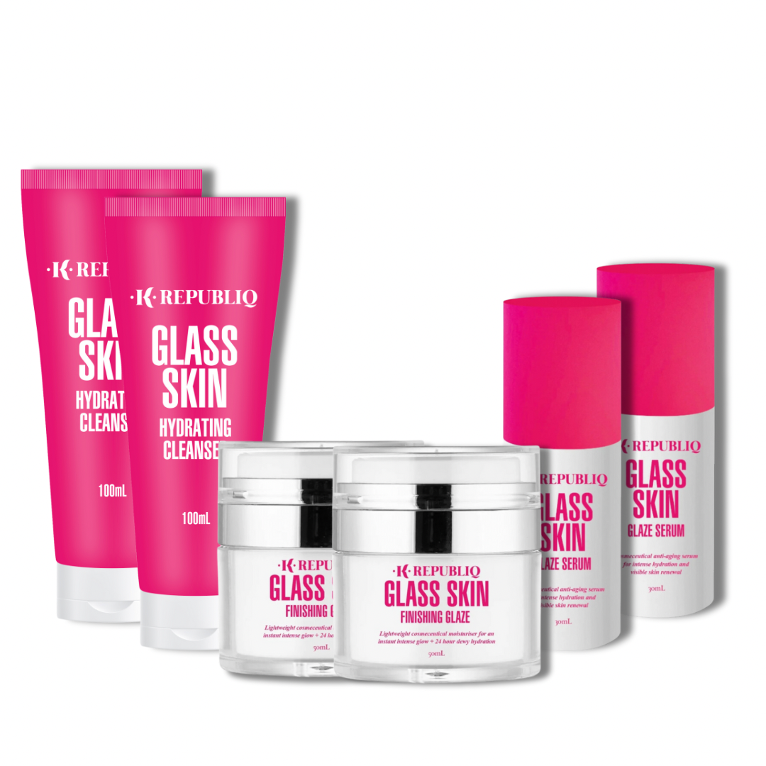 A K Republiq skincare kit including bottles and tubes of various products labeled 'Glass Skin', indicating a two-month supply of products for achieving glass skin complexion.