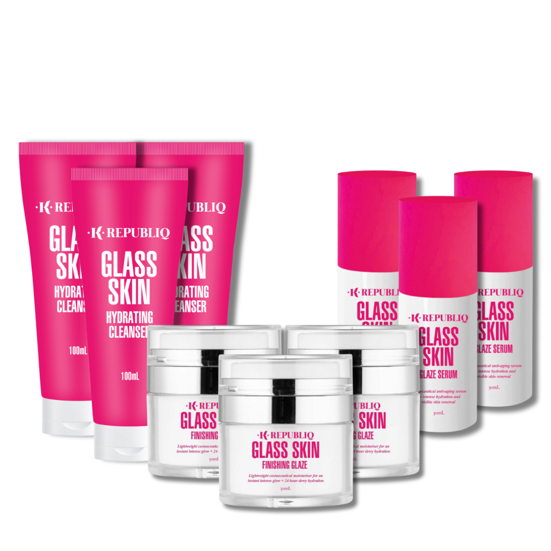 A set of K Republiq skincare products including three bottles labeled as Glass Skin Hydrating Cleanser, Glass Skin Glaze Serum, and Glass Skin Finishing Glaze, with vibrant pink packaging.