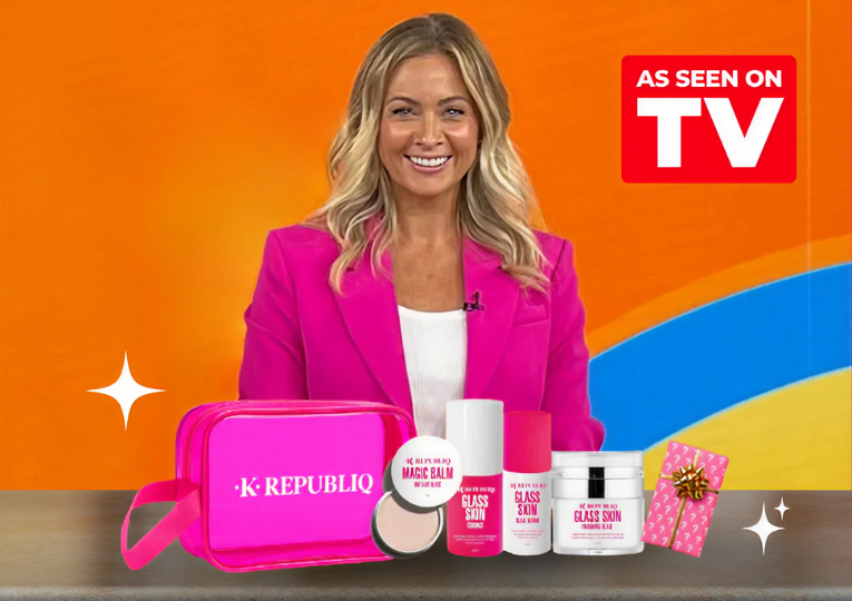Close-up of K Republiq products with woman in pink blazer on orange background