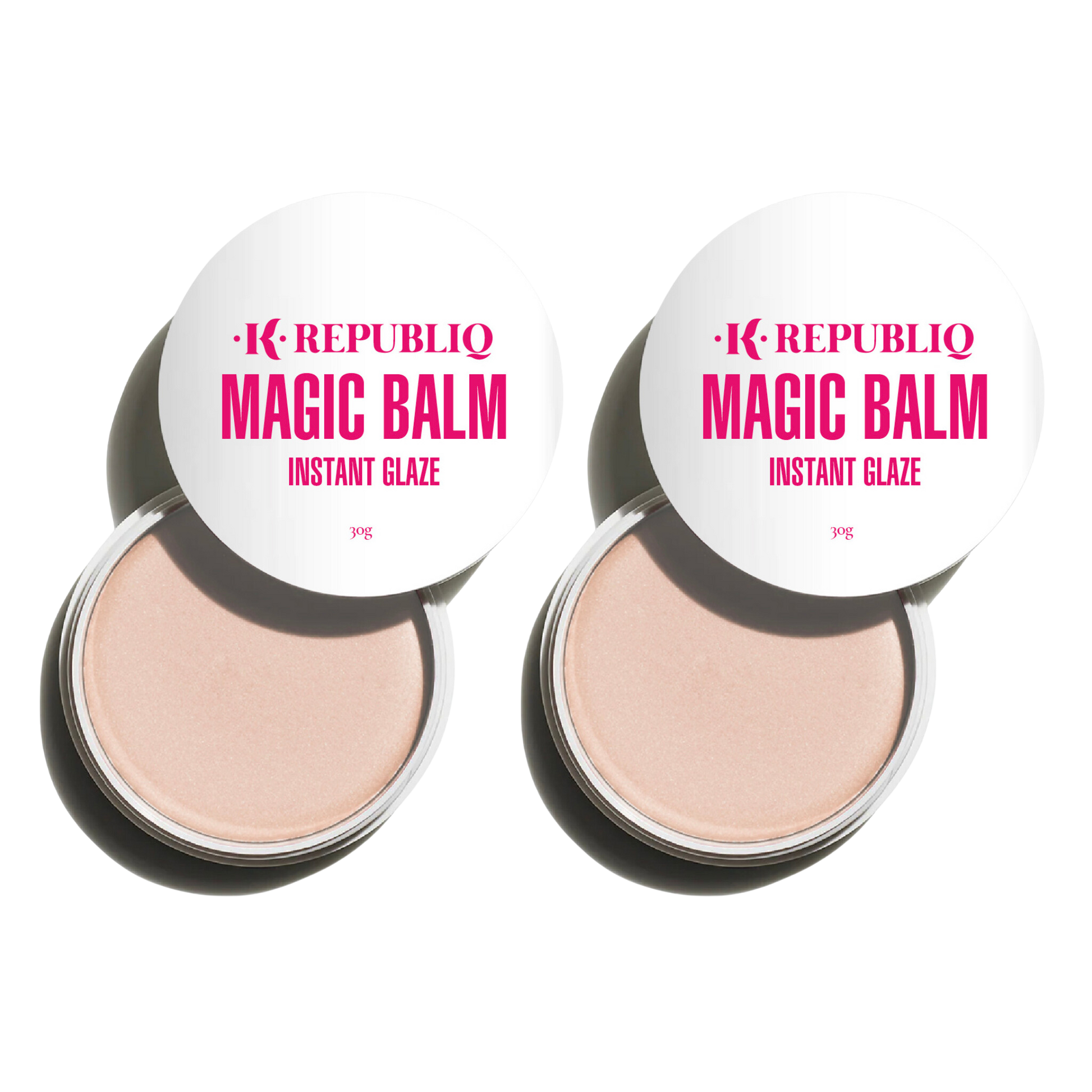 Two compact containers of K Republiq Magic Balm instant glaze, with the product visible through the open lids.