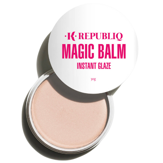 A jar of K Republiq Magic Balm Instant Glaze, with the product visible through a open jar lid, against a transparent background.