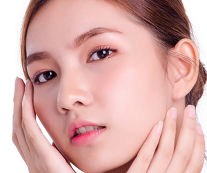 Close-up of a woman with smooth, glowing skin showing natural glass skin radiance
