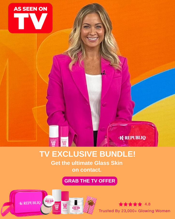 A smiling woman in a pink blazer standing behind a table with several K Republiq skincare products, including a "Magic Balm" and a "Glass Skin" line. Below her, the bundle is shown again with text that reads "Get the ultimate Glass Skin on contact," "GRAB THE TV OFFER," and "Trusted By 23,000+ Glowing Women." The image also has a "AS SEEN ON TV" banner in the top left corner.